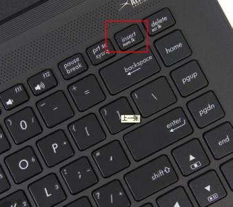华硕笔记本切换小键盘 华硕笔记本键盘字母变数字怎么转换,笔记本数字键盘切换